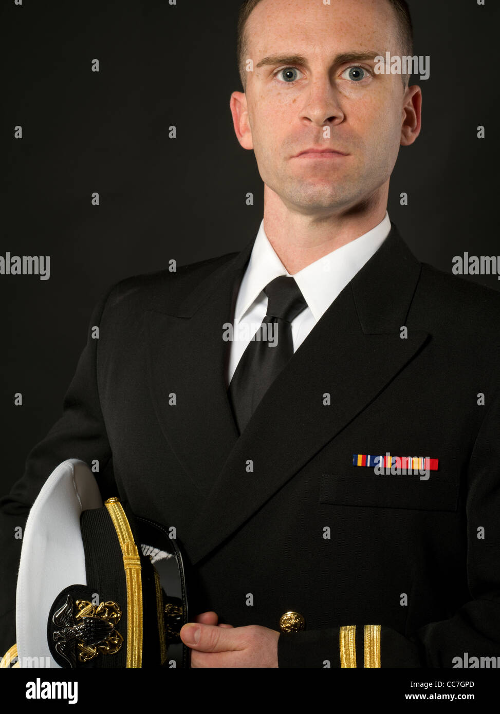 United States Navy Officer In Service Dress Blues Uniform With