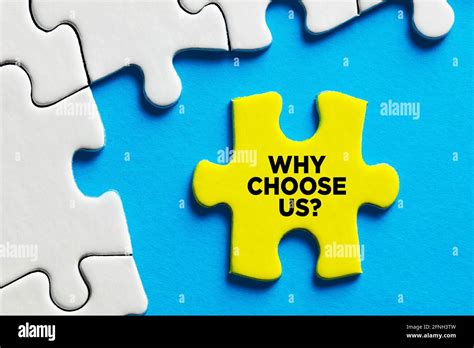 Why Choose Us Message Written On A Puzzle Piece The Reason Or Benefit